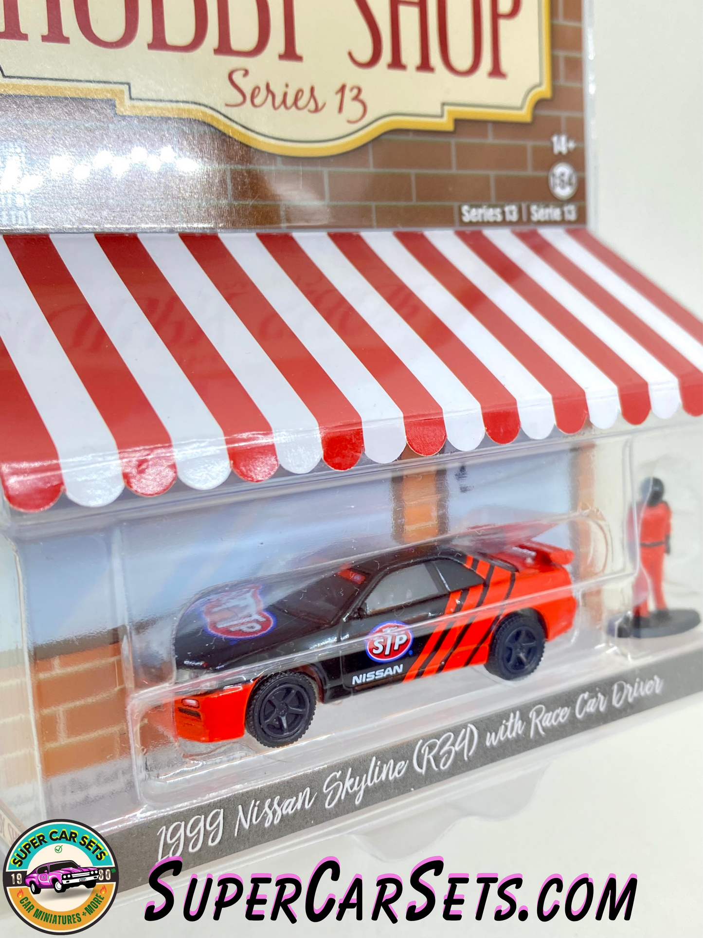 1999 Nissan Skyline (R34) with Race Car Driver - The Hobby Shop Series 13 made by Greenlight Collectibles