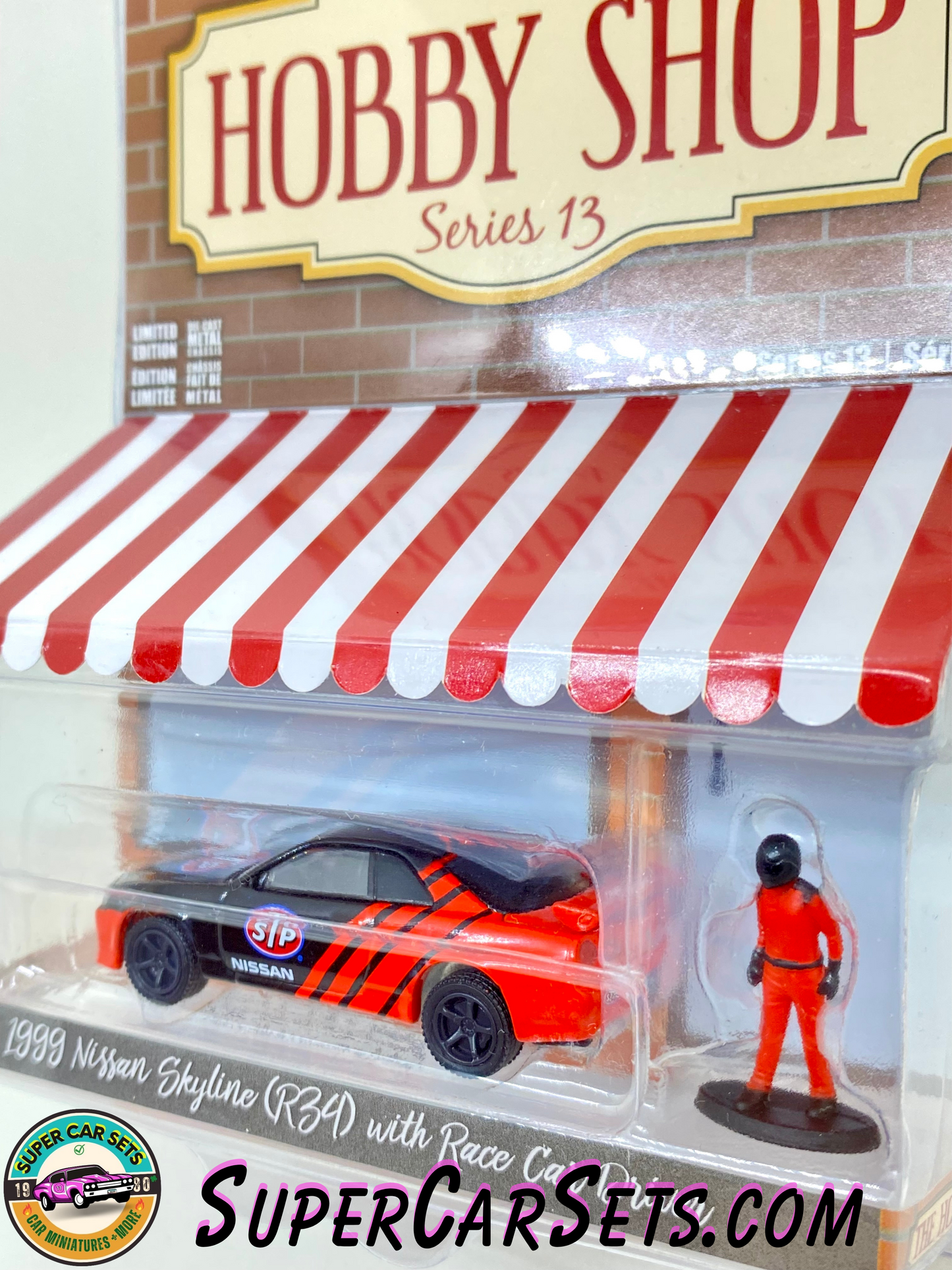 1999 Nissan Skyline (R34) with Race Car Driver - The Hobby Shop Series 13 made by Greenlight Collectibles