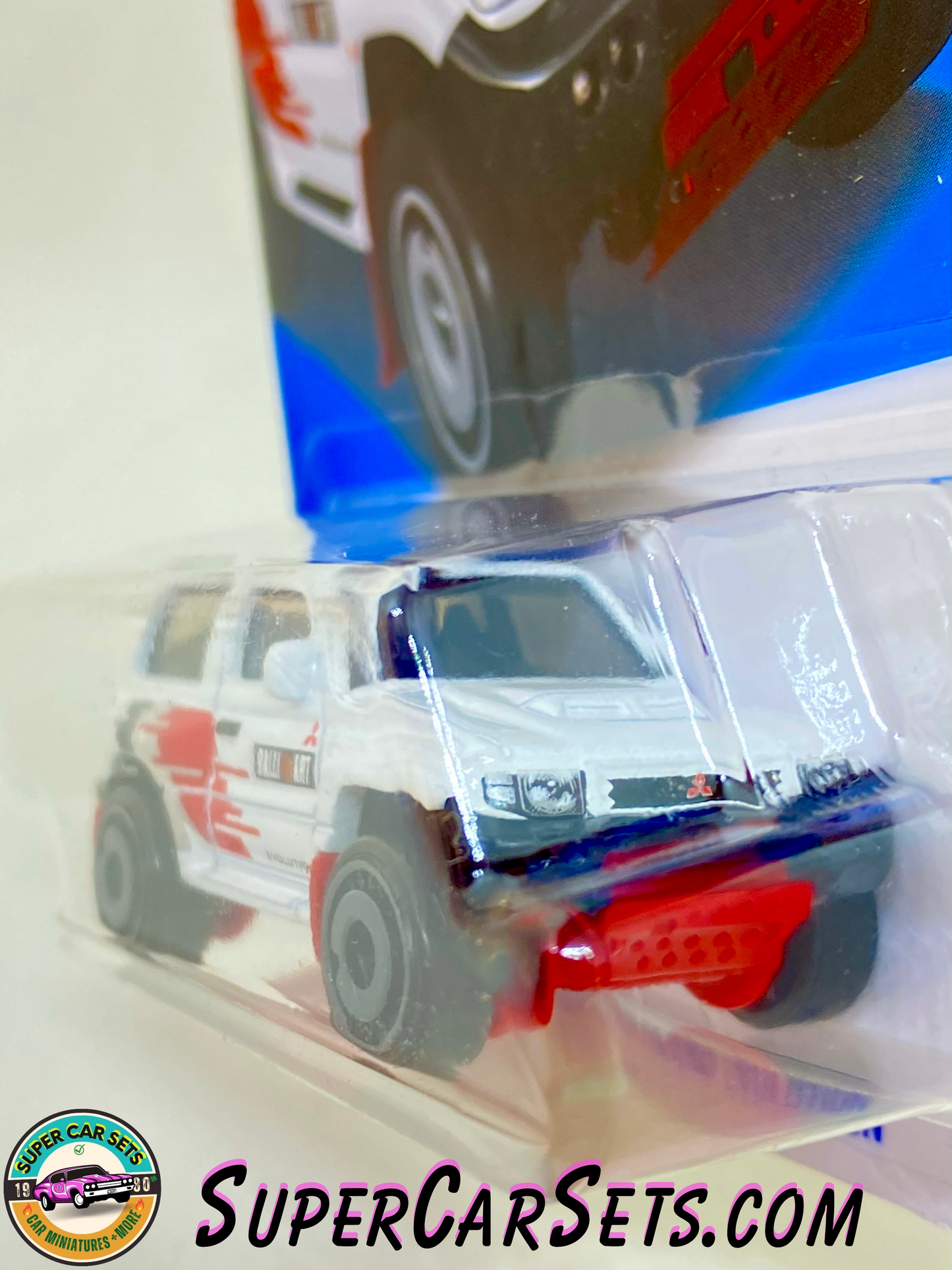 Mitsubishi Pajero Evolution (white colour) - Hot Wheels Mud Studs - 2023 (3/5) (175/250)