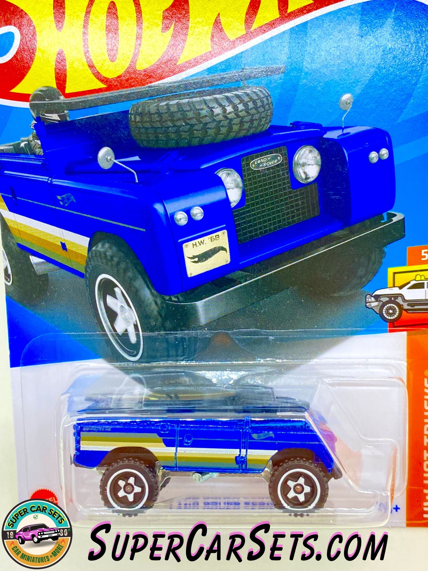 Land Rover Series II - Hot Wheels HW Hot Trucks - 2024 (5/10) (92/250) (Dark blue colour with white, yellow, and green stripes)