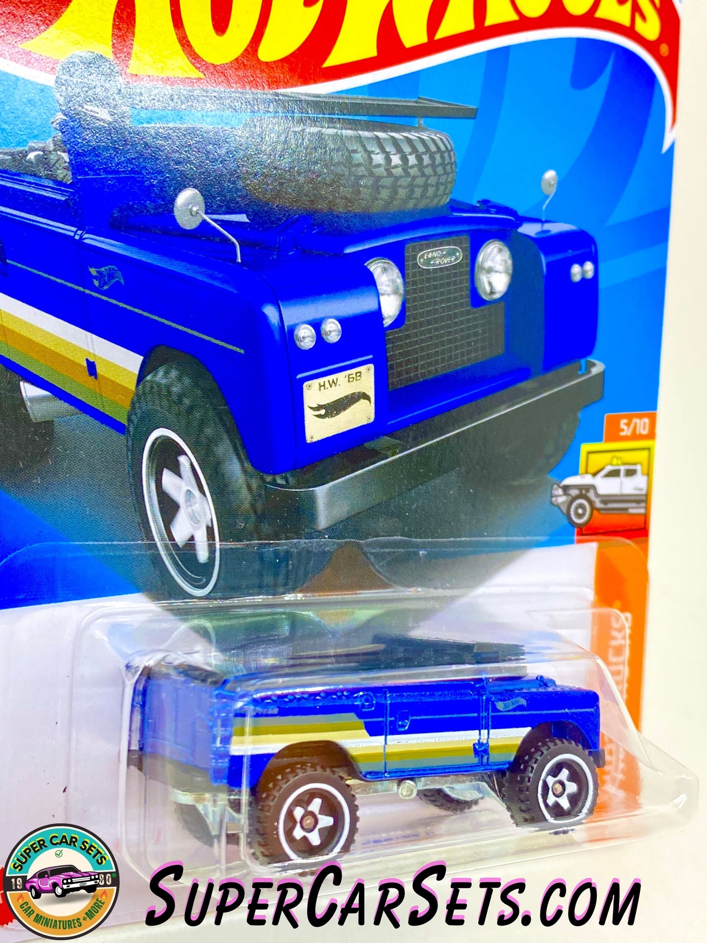 Land Rover Series II - Hot Wheels HW Hot Trucks - 2024 (5/10) (92/250) (Dark blue colour with white, yellow, and green stripes)