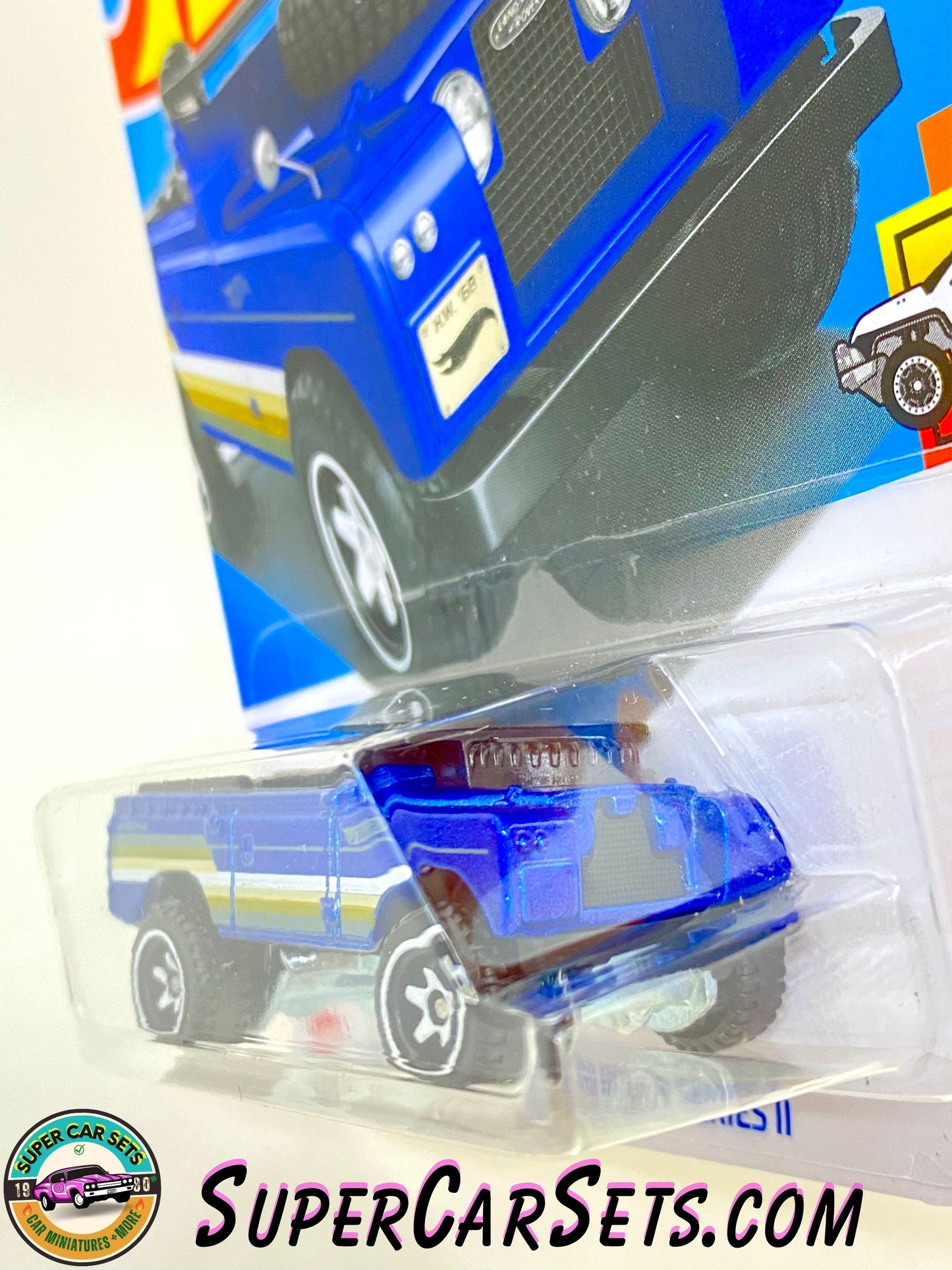 Land Rover Series II - Hot Wheels HW Hot Trucks - 2024 (5/10) (92/250) (Dark blue colour with white, yellow, and green stripes)