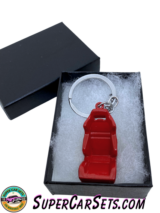 Keychain car seat - red colour