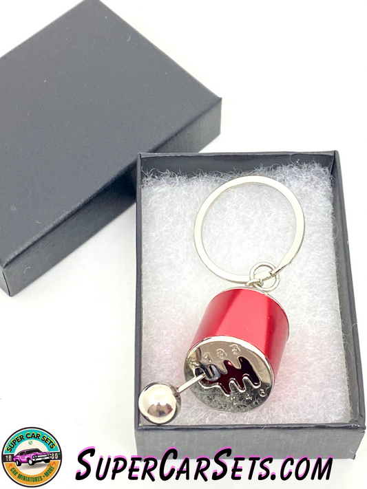 Keychain Gear box - red colour