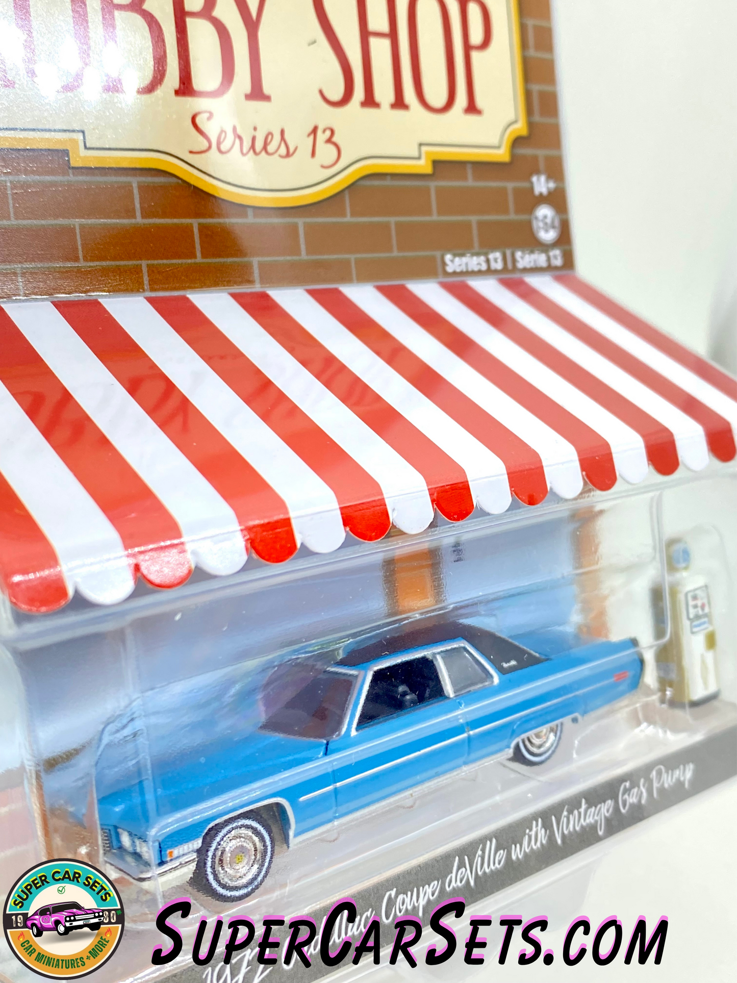 1972 Cadillac Coupe deVille with Vintage Gas Pump - The Hobby Shop Series 13 made by Greenlight Collectibles