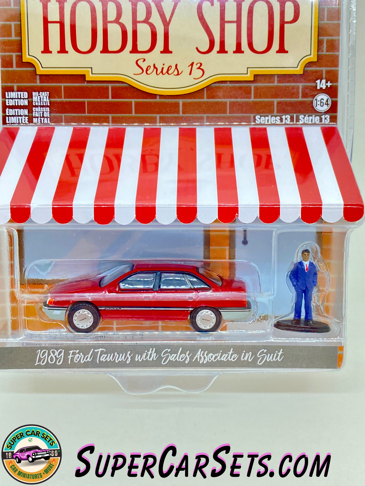 1989 Ford Taurus with Sales Associated in Suit - The Hobby Shop Series 13 made by Greenlight Collectibles