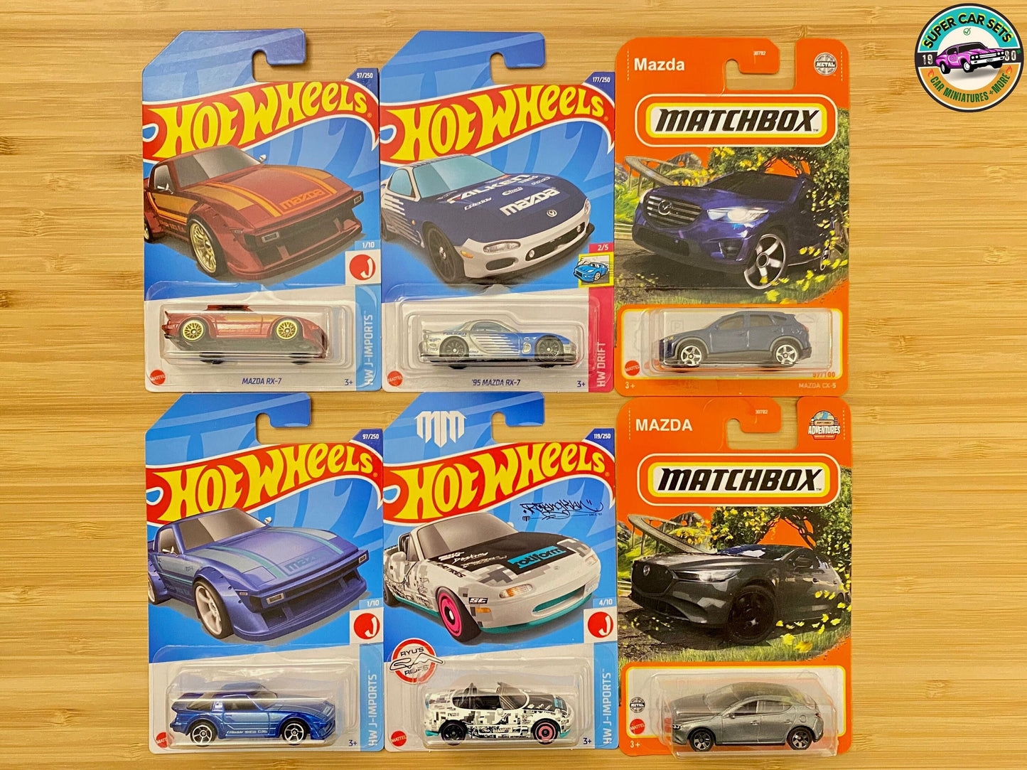 Set mit 6 MAZDA-Autos • MazdaRX-7 rot • MazdaRX-7 blau • 2019 Mazda 3 • CX-5 • '95 Rx-7 • '91 Mx-5 Miata, hergestellt von Hot Wheels und Matchbox