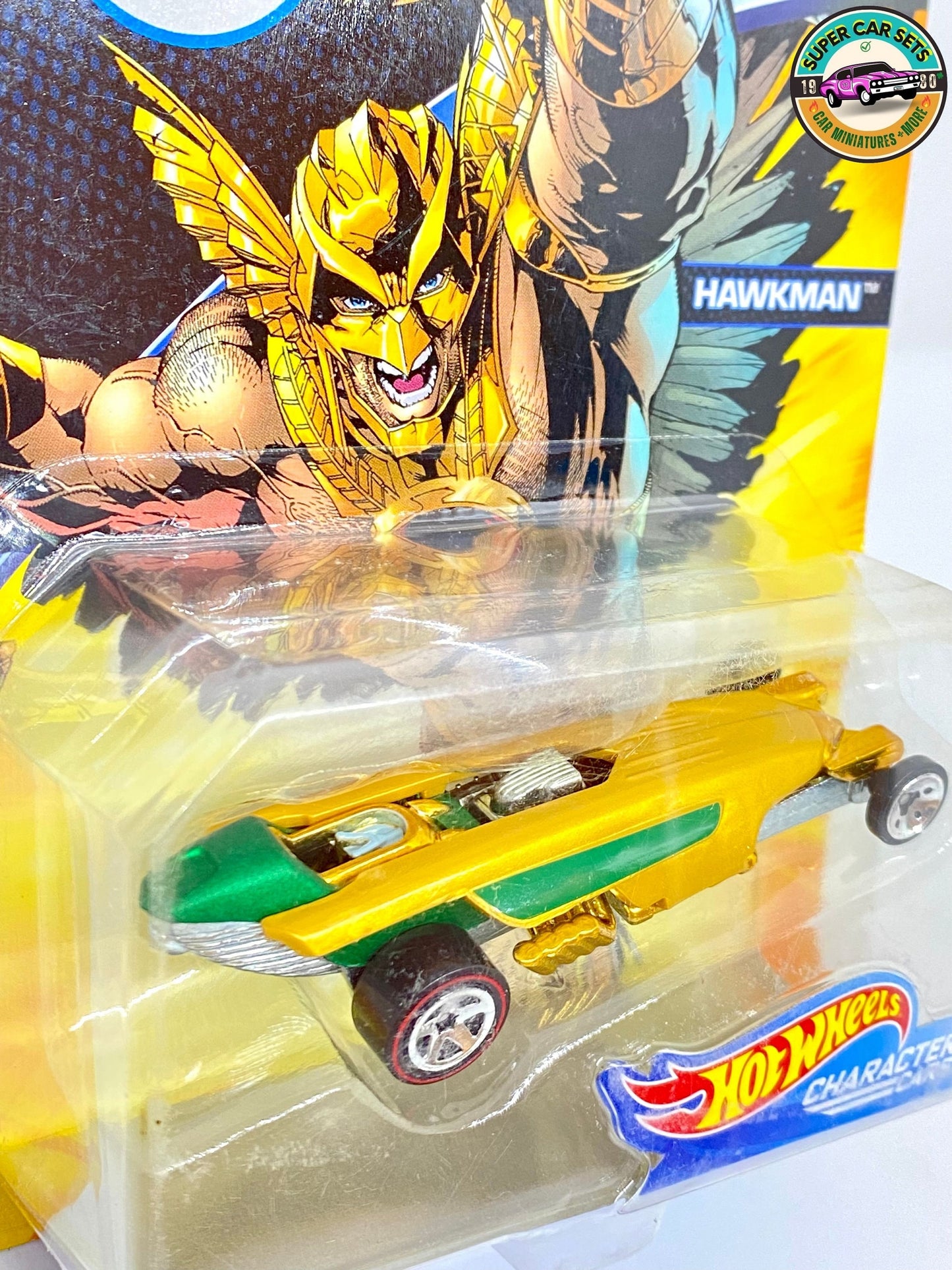 Hawkman - DC - Hot Wheels (voiture parfaite, mais carte rayée)