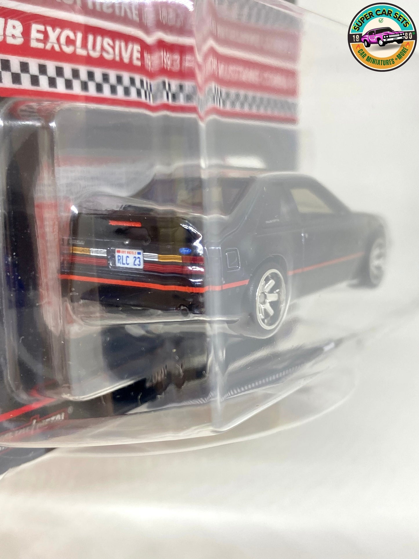 Hot Wheels RLC ’93 Ford Cobra R (including an embroidered patch and a glossy pin)