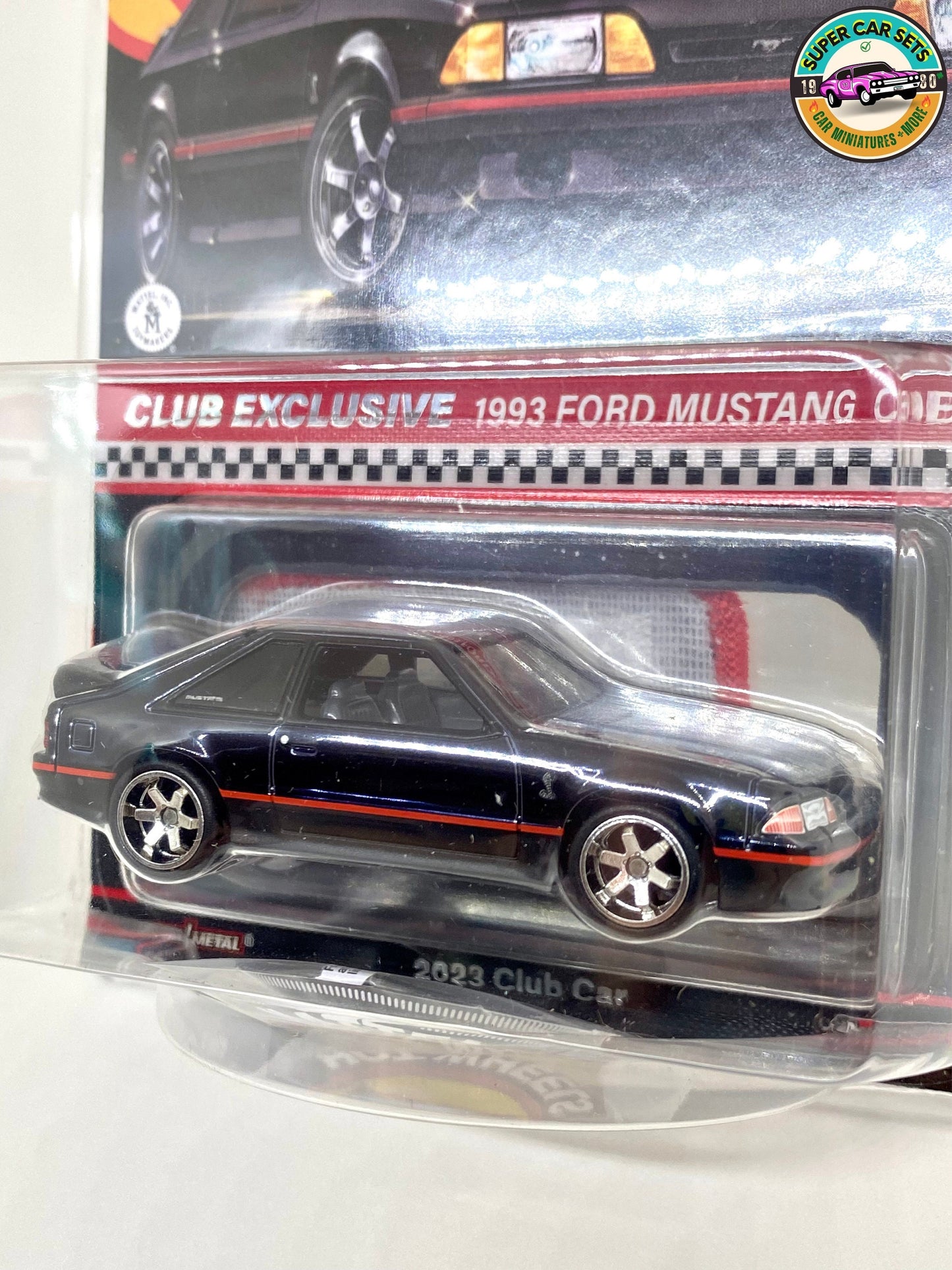 Hot Wheels RLC ’93 Ford Cobra R (including an embroidered patch and a glossy pin)