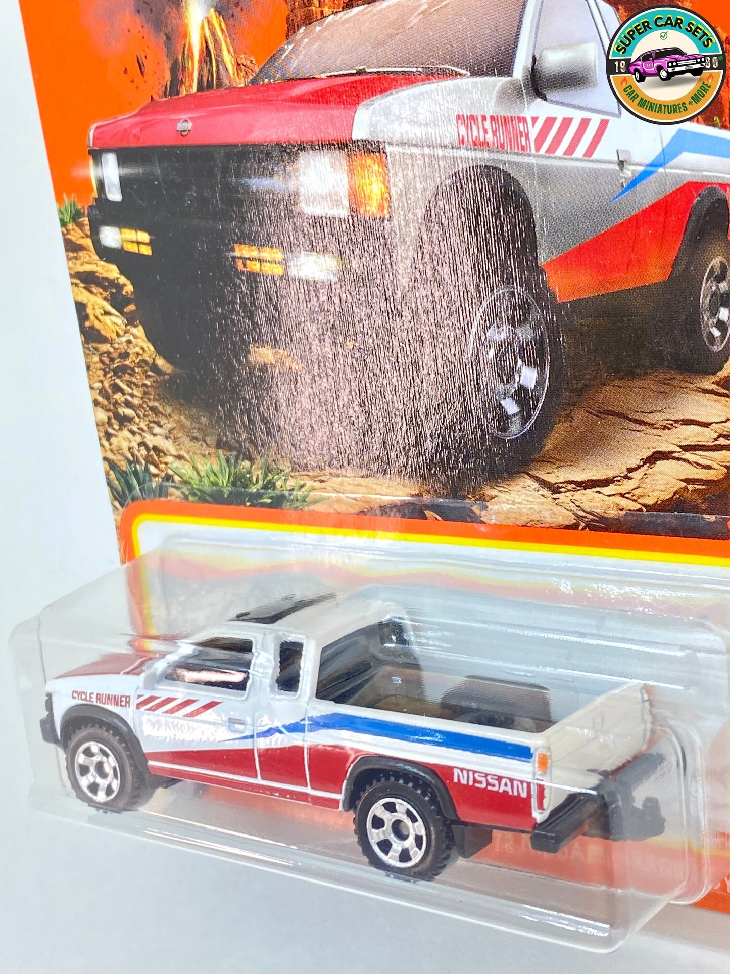 Matchbox - Nissan Hardbody (D21) '95 - (blanc, rouge et bleu)