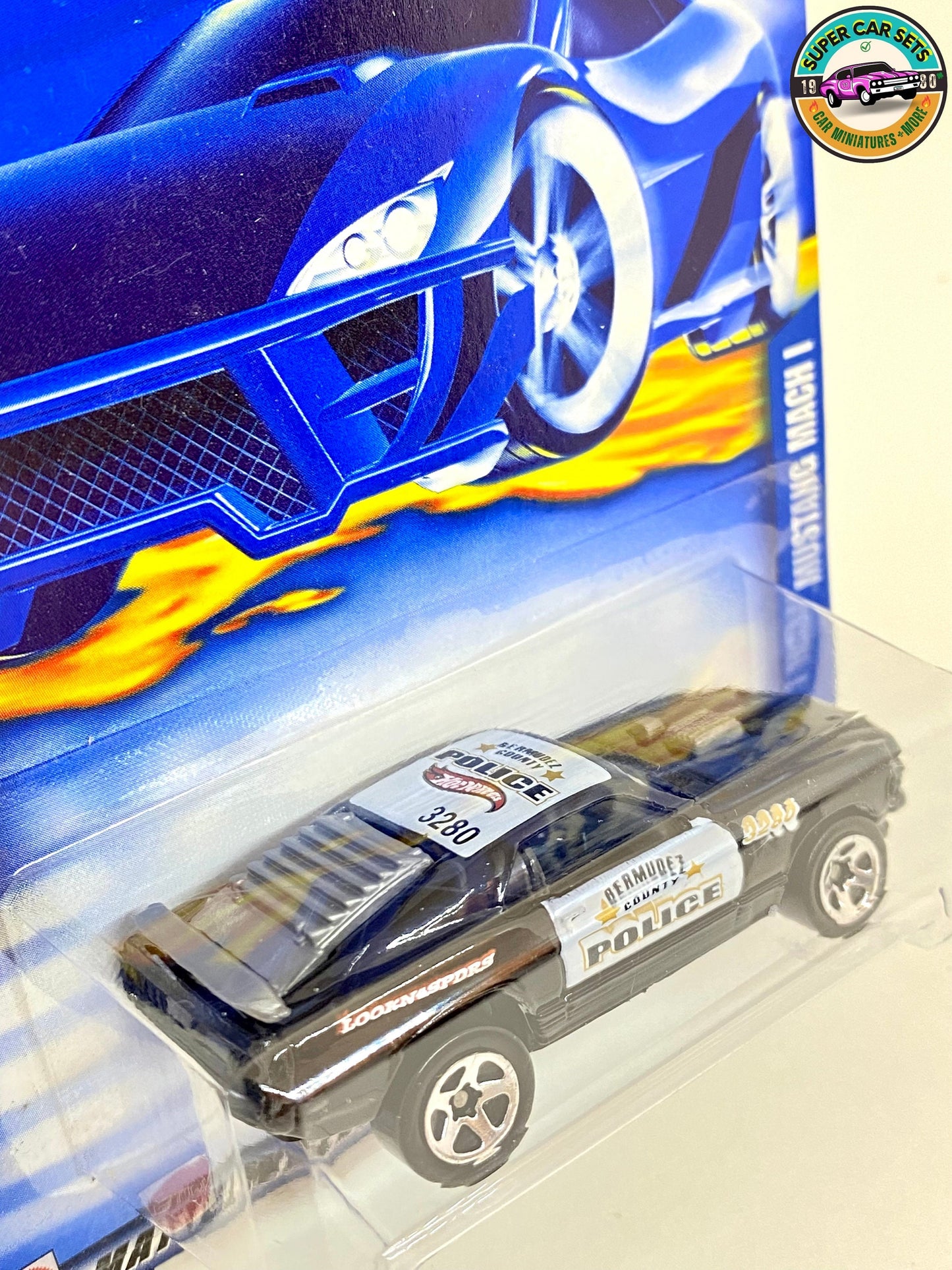 Hot Wheels - (VINTAGE) - Mustang Mach I - Police du comté de Bermudez (#179) (année de lancement 2002)